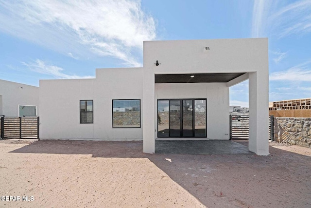 13399 Jeff Winton Dr, El Paso, TX 79928 - rear view of property with stucco siding