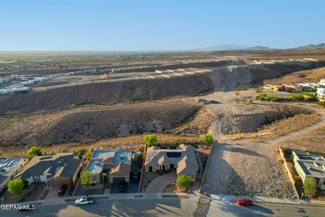 7301 Brays Landing Dr, El Paso, TX 79911 - aerial perspective of suburban area with a mountain backdrop