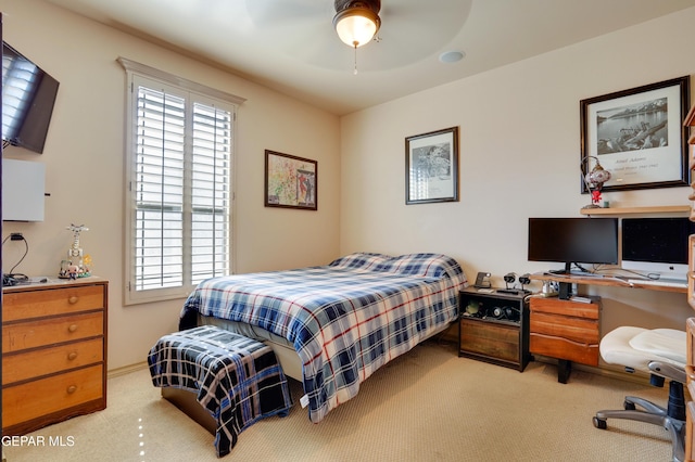 7301 Brays Landing Dr, El Paso, TX 79911 - carpeted bedroom with an office area and ceiling fan