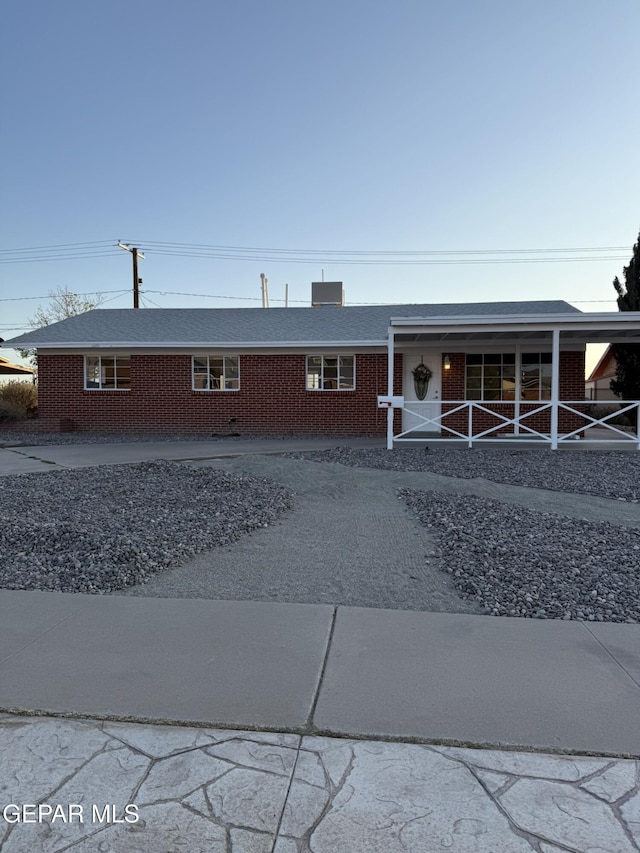6220 Bel Mar Ave, El Paso, TX 79912 - single story home featuring brick siding and covered porch