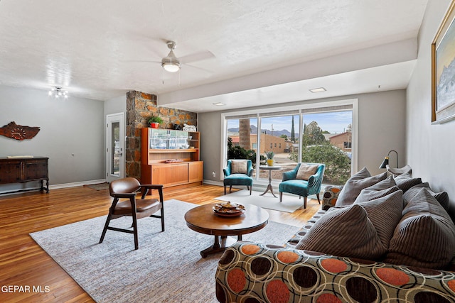 4012 Hastings Dr, El Paso, TX 79903 - living room with wood finished floors, a ceiling fan, and baseboards