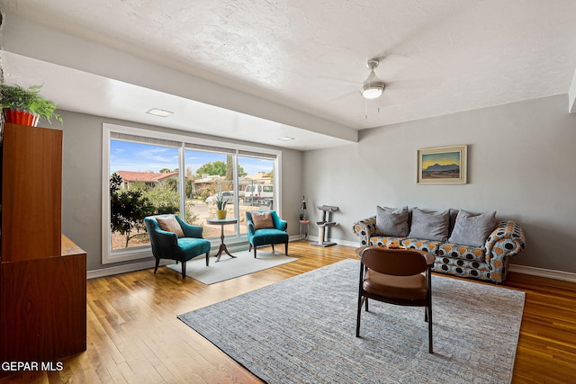 4012 Hastings Dr, El Paso, TX 79903 - living room with ceiling fan, wood finished floors, and baseboards