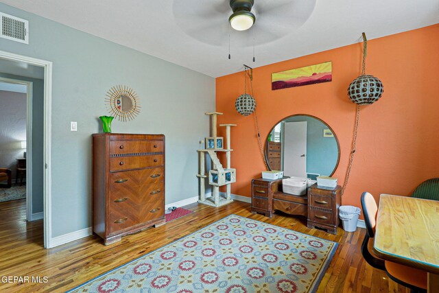 4012 Hastings Dr, El Paso, TX 79903 - bedroom with wood finished floors, baseboards, and ceiling fan