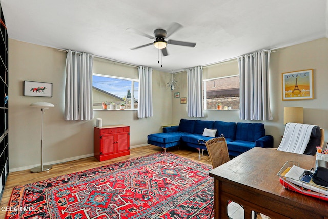 4012 Hastings Dr, El Paso, TX 79903 - living area with wood finished floors, a ceiling fan, and baseboards