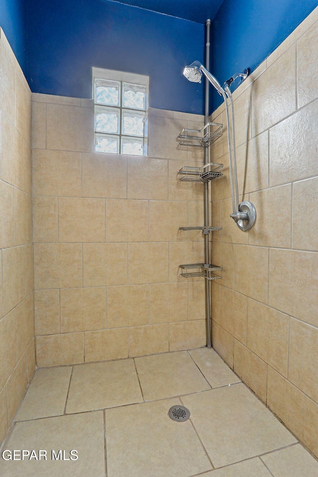 4012 Hastings Dr, El Paso, TX 79903 - full bath with a tile shower and tile patterned floors