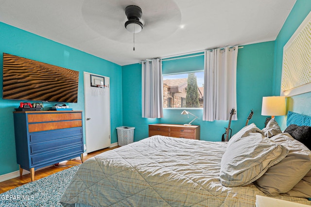 4012 Hastings Dr, El Paso, TX 79903 - bedroom featuring wood finished floors, baseboards, and a ceiling fan