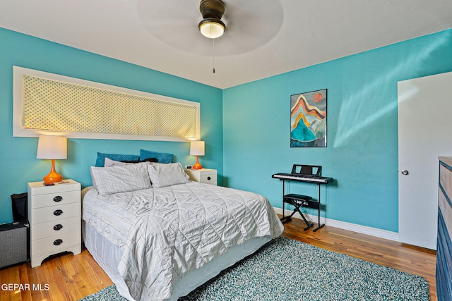 4012 Hastings Dr, El Paso, TX 79903 - bedroom with wood finished floors, baseboards, and ceiling fan