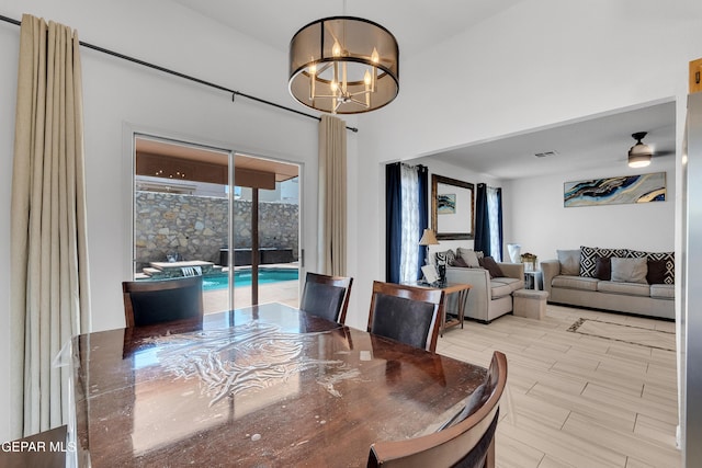 532 Gentry Way, El Paso, TX 79928 - dining area with a chandelier
