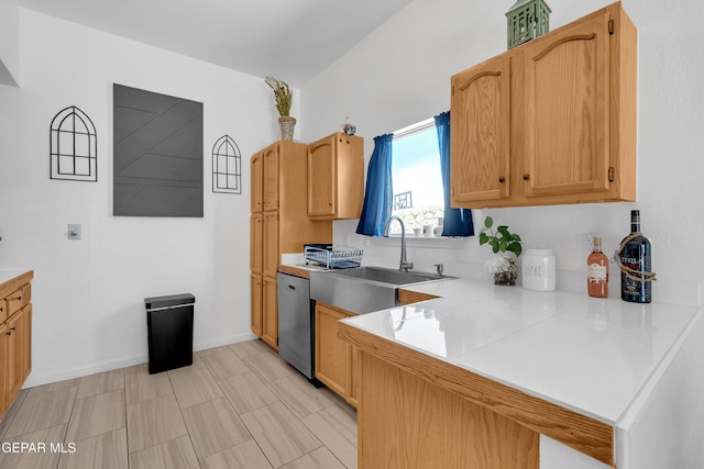 532 Gentry Way, El Paso, TX 79928 - kitchen with a sink, a peninsula, light countertops, and stainless steel dishwasher