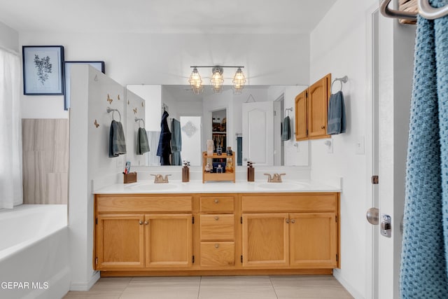 532 Gentry Way, El Paso, TX 79928 - bathroom featuring double vanity, a chandelier, tile patterned flooring, and a garden tub