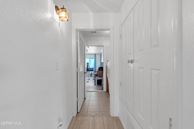 532 Gentry Way, El Paso, TX 79928 - corridor with light tile patterned floors