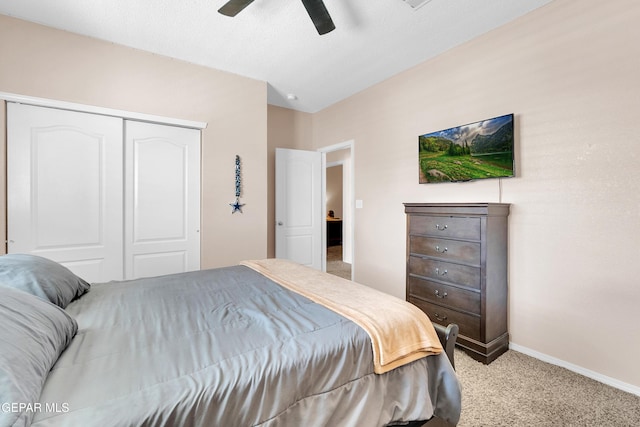 532 Gentry Way, El Paso, TX 79928 - bedroom featuring carpet floors, a closet, baseboards, and a ceiling fan