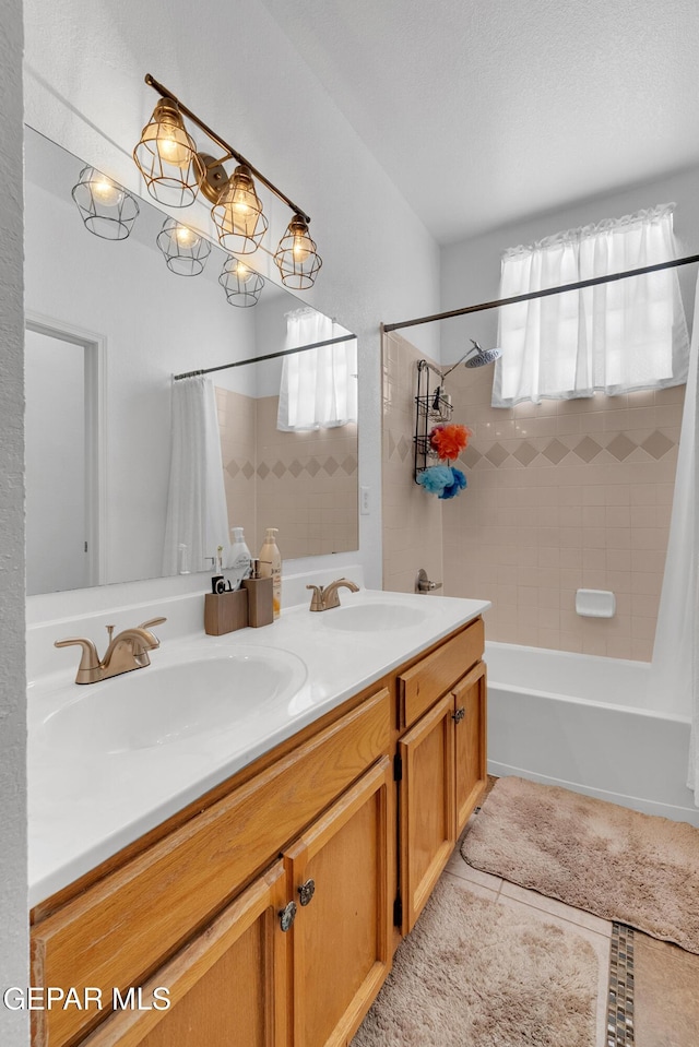 532 Gentry Way, El Paso, TX 79928 - bathroom featuring shower / bath combo, double vanity, and tile patterned flooring