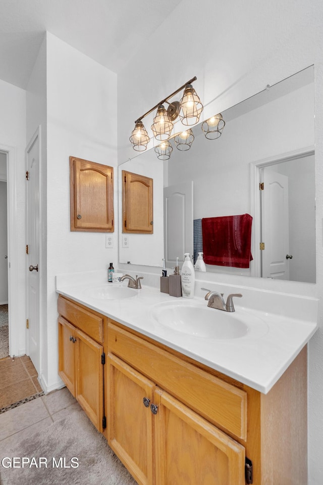 532 Gentry Way, El Paso, TX 79928 - bathroom with double vanity and tile patterned flooring