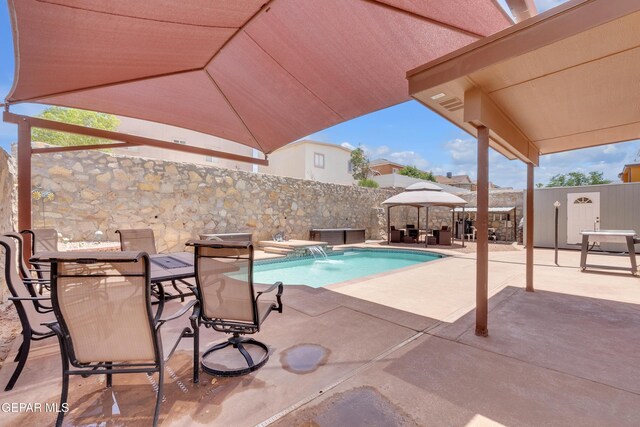 532 Gentry Way, El Paso, TX 79928 - view of swimming pool featuring a gazebo, a patio, and outdoor dining space