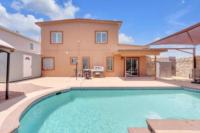532 Gentry Way, El Paso, TX 79928 - outdoor pool featuring a patio and a grill