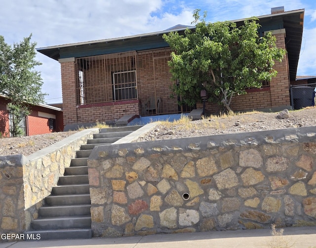 3812 Wilson Way, El Paso, TX 79903 - view of front of home with stairway and brick siding