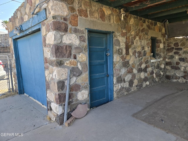 3812 Wilson Way, El Paso, TX 79903 - doorway to property featuring stone siding