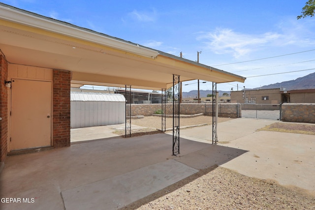 8957 Robert Dr Unit A & B, El Paso, TX 79904 - view of patio / terrace featuring a mountain view