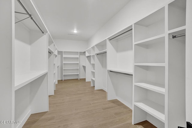 820 W Gate, El Paso, TX 79932 - walk in closet featuring light wood finished floors