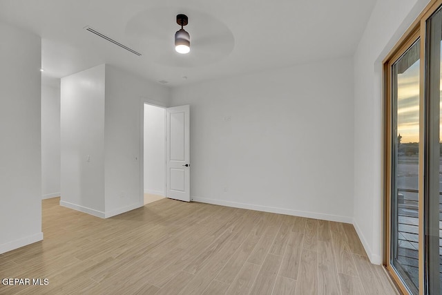 820 W Gate, El Paso, TX 79932 - spare room featuring light wood-style floors, baseboards, and ceiling fan