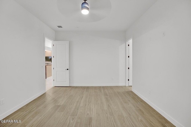 820 W Gate, El Paso, TX 79932 - unfurnished room featuring ceiling fan, light wood finished floors, and baseboards