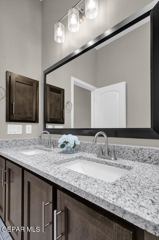 13404 Coldham St, El Paso, TX 79928 - bathroom featuring double vanity