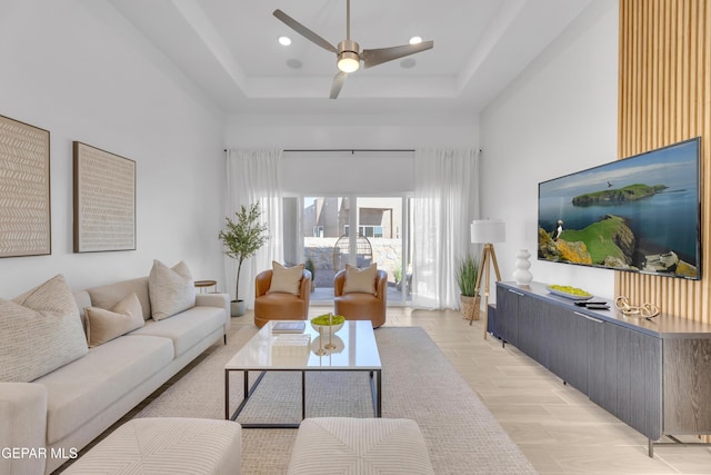 13404 Coldham St, El Paso, TX 79928 - living area featuring a ceiling fan, a tray ceiling, and a towering ceiling