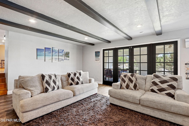 6008 Camino Alegre Dr, El Paso, TX 79912 - living room with baseboards, french doors, beamed ceiling, a textured ceiling, and wood finished floors