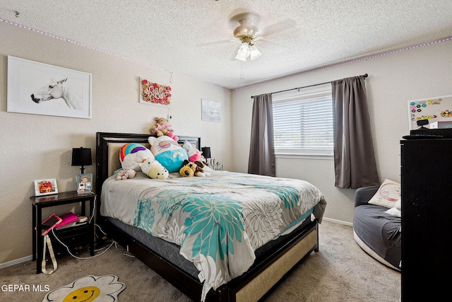 6008 Camino Alegre Dr, El Paso, TX 79912 - bedroom with carpet, a textured ceiling, baseboards, and ceiling fan