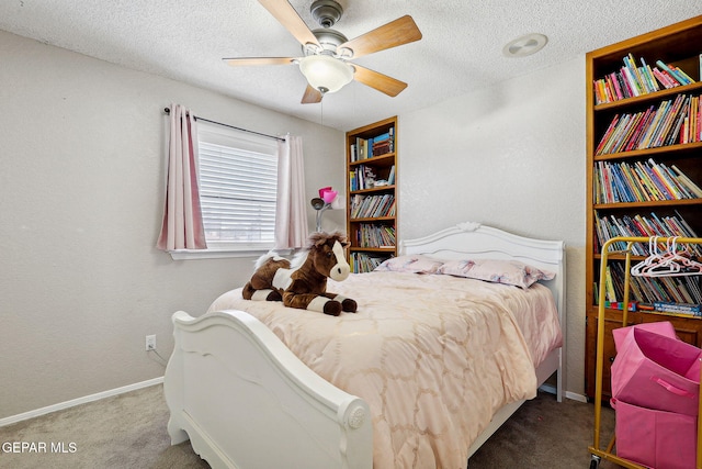 6008 Camino Alegre Dr, El Paso, TX 79912 - carpeted bedroom featuring a textured ceiling, ceiling fan, and baseboards
