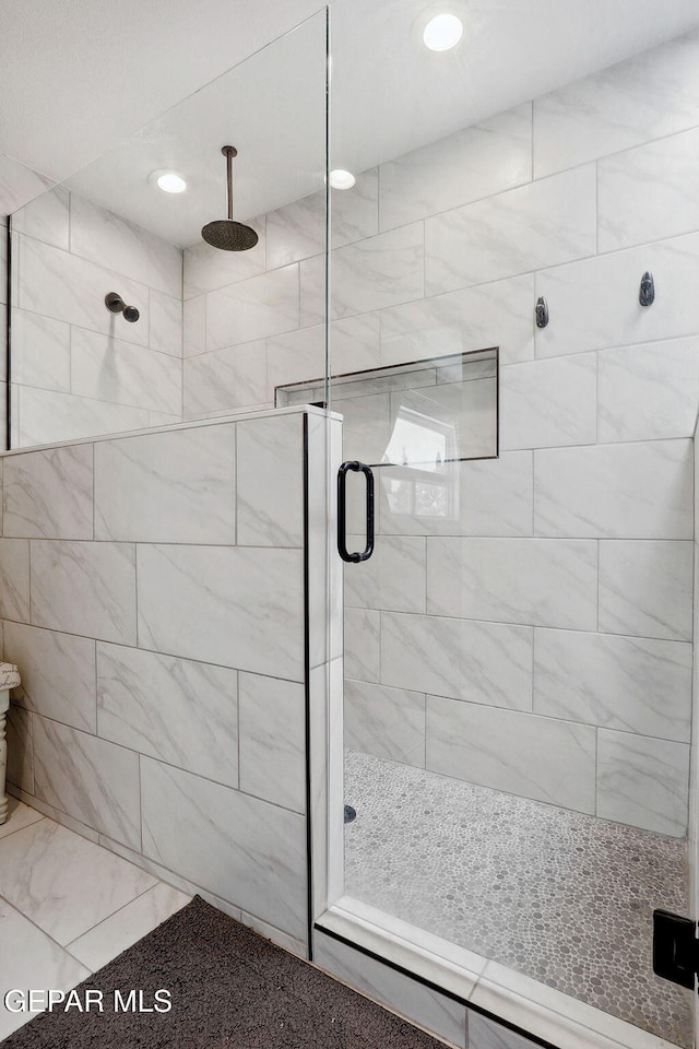 6008 Camino Alegre Dr, El Paso, TX 79912 - bathroom with a shower stall and recessed lighting