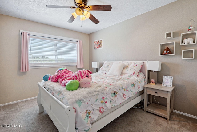 6008 Camino Alegre Dr, El Paso, TX 79912 - bedroom with carpet, baseboards, a textured ceiling, and a ceiling fan