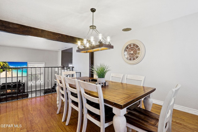 6008 Camino Alegre Dr, El Paso, TX 79912 - dining space with a chandelier, wood finished floors, beam ceiling, and baseboards
