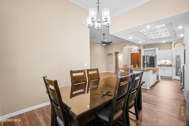 14624 Long Shadow Ave, El Paso, TX 79938 - dining room with ornamental molding, light wood-style flooring, arched walkways, a chandelier, and recessed lighting