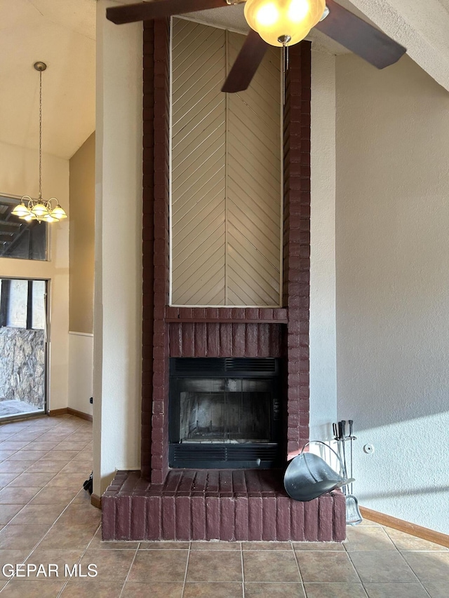 6061 Bridalveil Dr, El Paso, TX 79924 - detailed view of baseboards, a fireplace, ceiling fan, and a textured wall