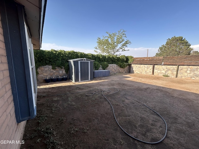 6061 Bridalveil Dr, El Paso, TX 79924 - fenced backyard with a storage unit