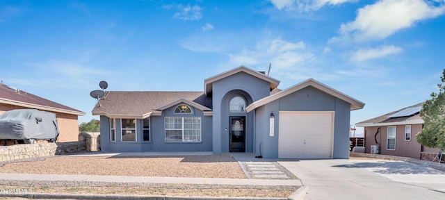13324 Mitchell Dr, Horizon City, TX 79928 - single story home with stucco siding, driveway, and a garage