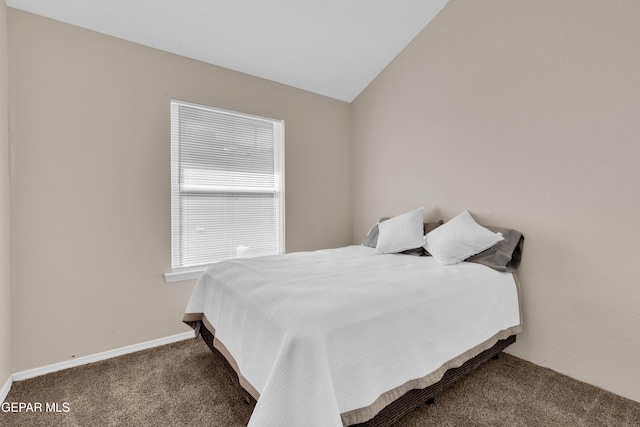 13324 Mitchell Dr, Horizon City, TX 79928 - carpeted bedroom featuring baseboards and vaulted ceiling