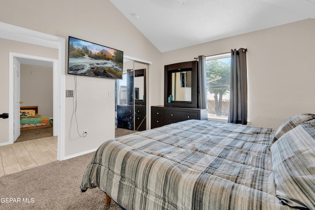 13324 Mitchell Dr, Horizon City, TX 79928 - carpeted bedroom featuring vaulted ceiling, a closet, and baseboards