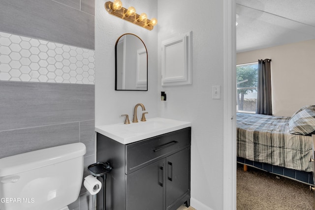 13324 Mitchell Dr, Horizon City, TX 79928 - bathroom with ensuite bath, vanity, and toilet