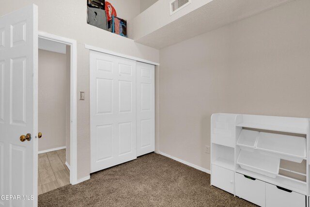 13324 Mitchell Dr, Horizon City, TX 79928 - unfurnished bedroom featuring carpet, baseboards, and a closet