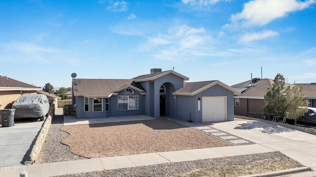 13324 Mitchell Dr, Horizon City, TX 79928 - ranch-style house with driveway, a garage, and stucco siding