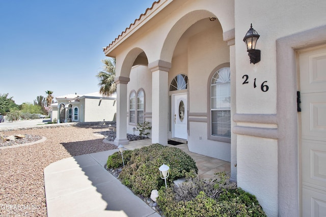 216 Desert Garden Dr, Santa Teresa, NM 88008 - entrance to property with stucco siding