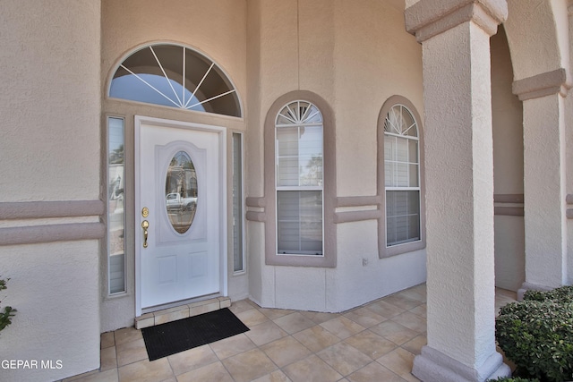 216 Desert Garden Dr, Santa Teresa, NM 88008 - doorway to property featuring stucco siding