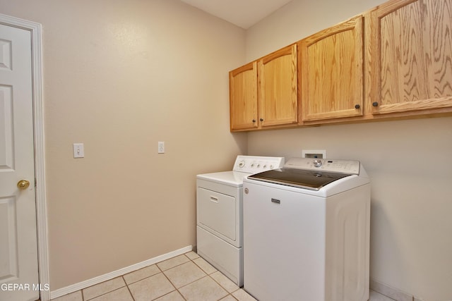 216 Desert Garden Dr, Santa Teresa, NM 88008 - washroom with cabinet space, separate washer and dryer, baseboards, and light tile patterned floors