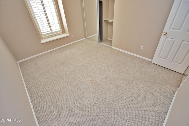 216 Desert Garden Dr, Santa Teresa, NM 88008 - unfurnished bedroom with a closet, carpet flooring, and baseboards
