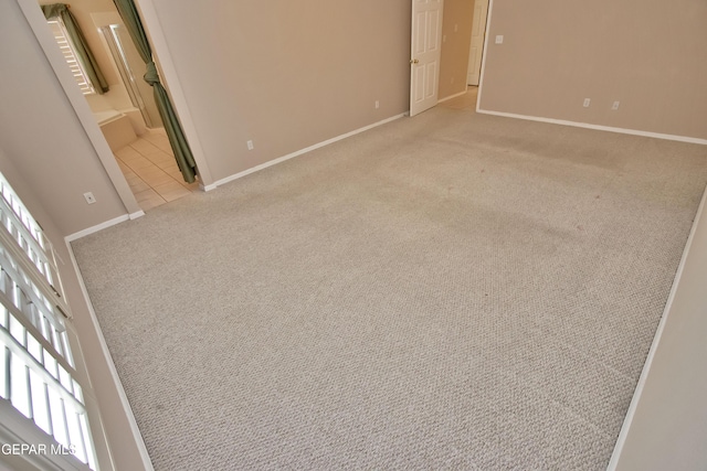 216 Desert Garden Dr, Santa Teresa, NM 88008 - spare room with light colored carpet and baseboards