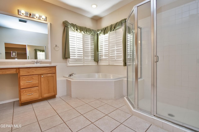 216 Desert Garden Dr, Santa Teresa, NM 88008 - full bathroom with vanity, a garden tub, tile patterned flooring, and a stall shower