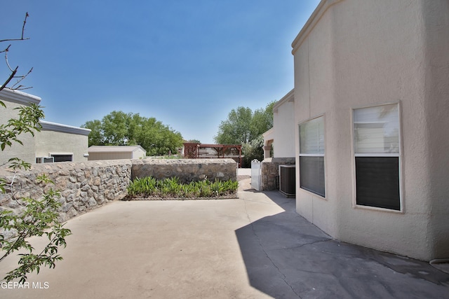 216 Desert Garden Dr, Santa Teresa, NM 88008 - view of patio with central AC unit